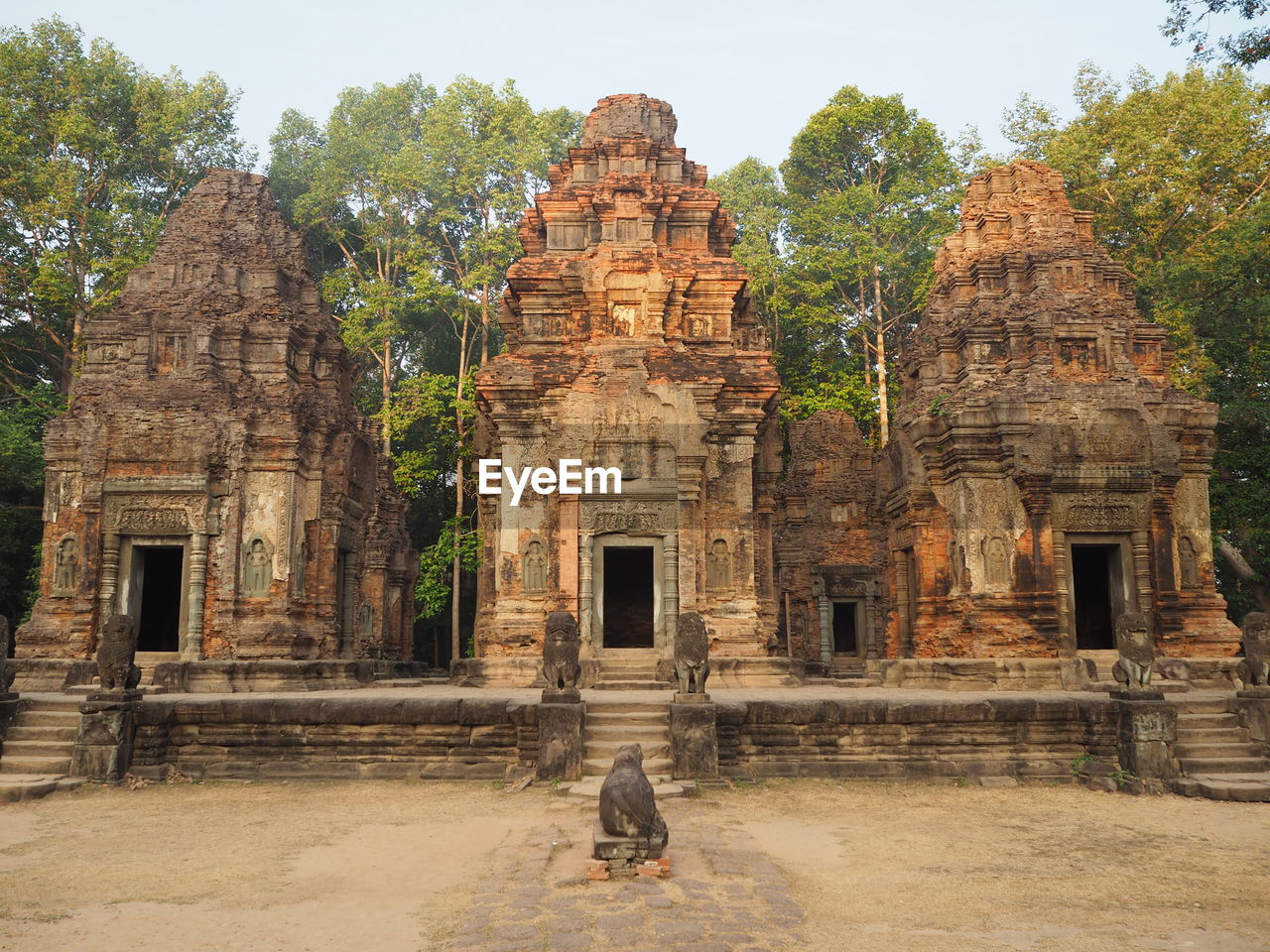 Preah ko temple against trees
