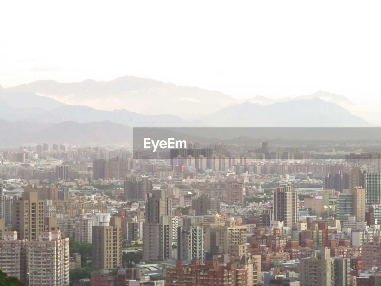 High angle view of buildings in city against sky