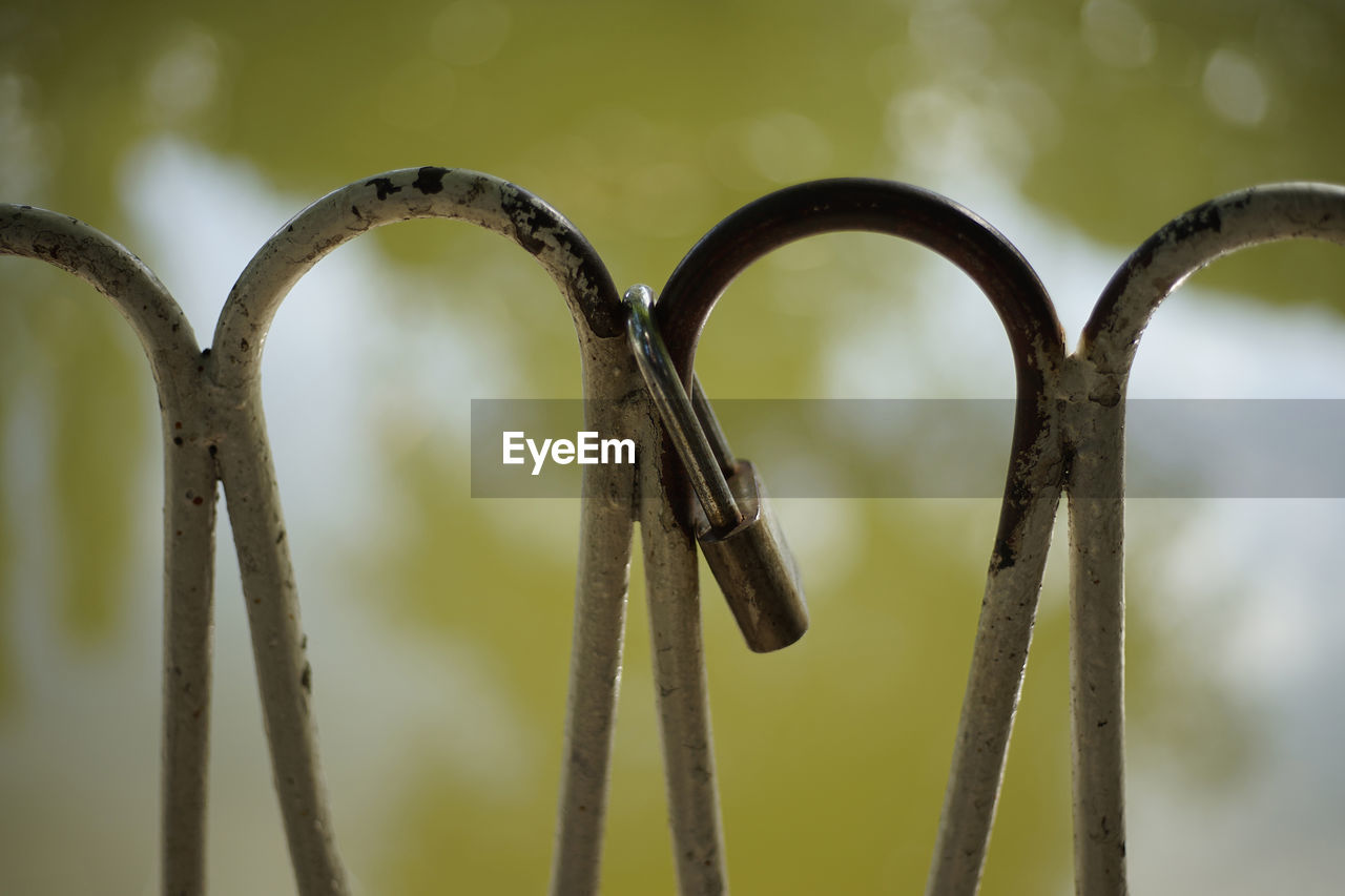 CLOSE-UP OF METAL FENCE