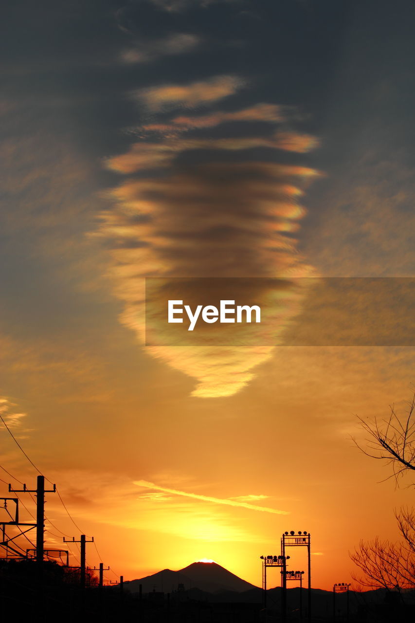 Cyclone in sky by mt fuji during sunset