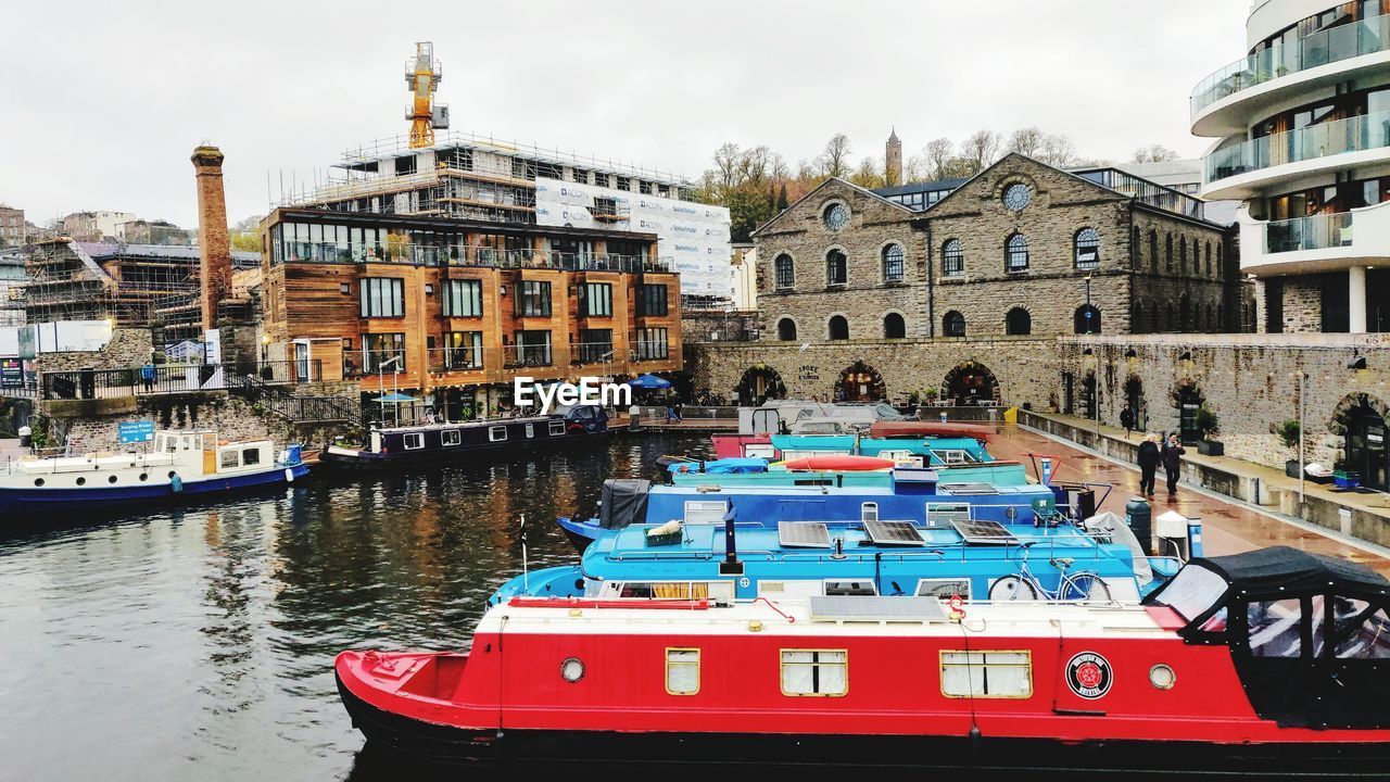 VIEW OF BOATS MOORED IN CANAL