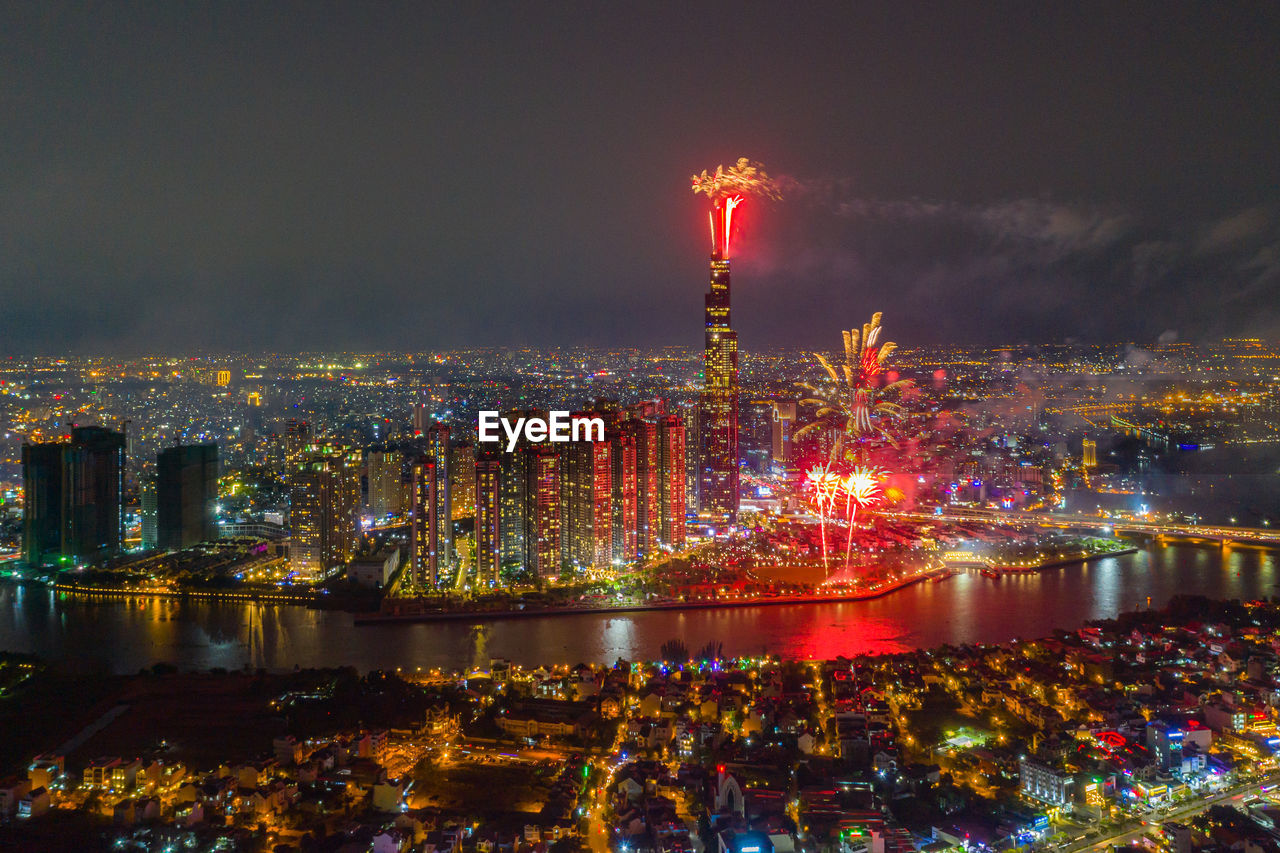 Beautiful cityscape of ho chi minh city - saigon and fireworks show