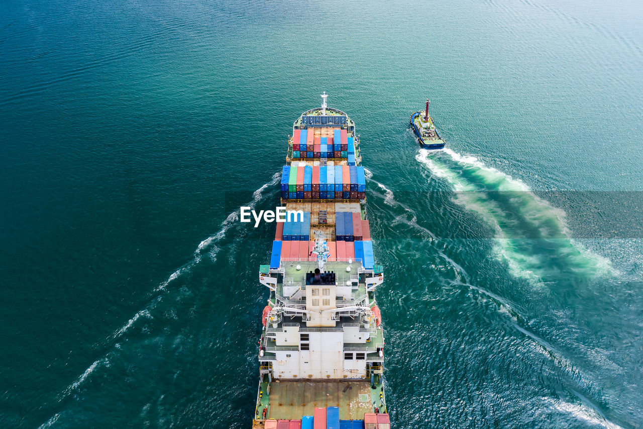 HIGH ANGLE VIEW OF SHIP AT SEA