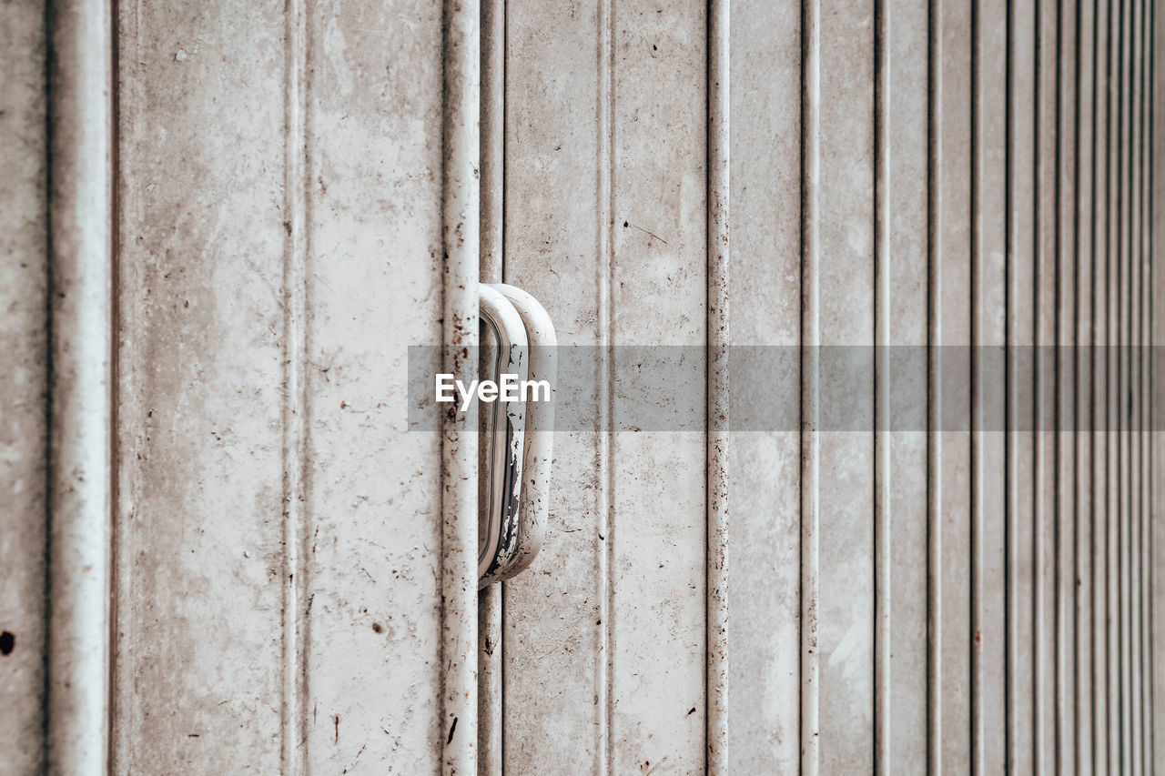 wood, full frame, no people, pattern, backgrounds, metal, textured, close-up, wall, day, floor, security, entrance, door, wall - building feature, protection, line, old, weathered, closed, built structure, outdoors, hardwood, iron, plank, architecture, flooring