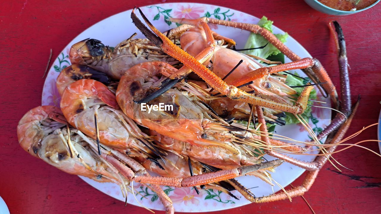 food and drink, food, seafood, crustacean, freshness, healthy eating, plate, shrimp, wellbeing, table, no people, high angle view, dish, animal, fish, prawn, seafood boil, lobster, shellfish, indoors, directly above, crab, meal, still life, cuisine, dendrobranchiata, close-up