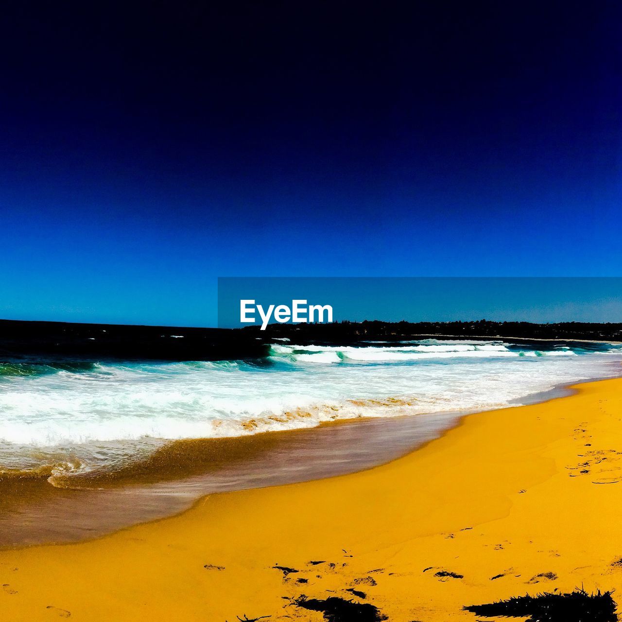 VIEW OF SEA AGAINST CLEAR SKY