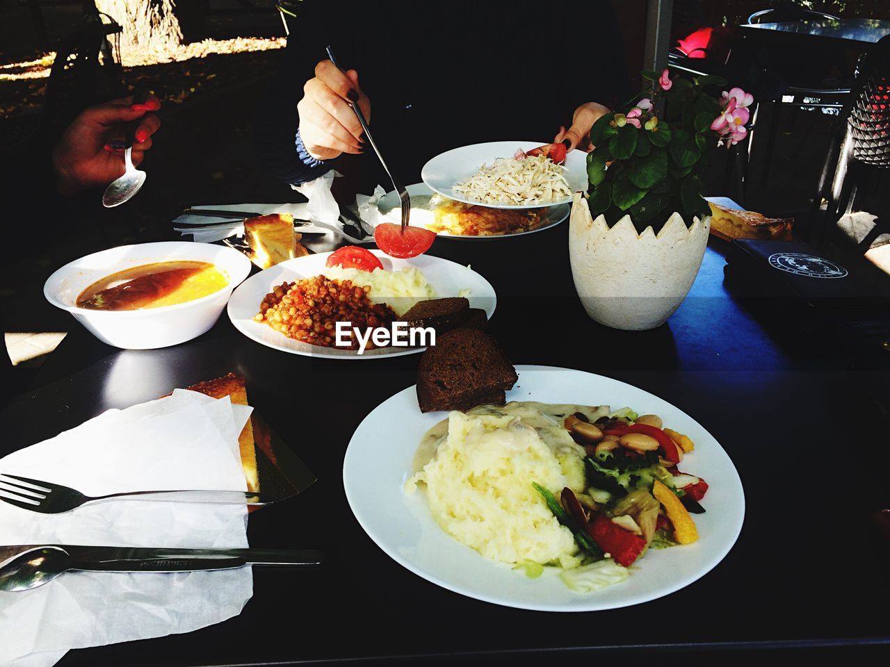 CLOSE-UP OF SERVED FOOD ON TABLE