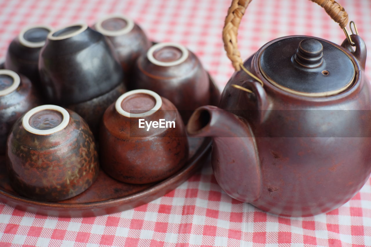 Close-up of crockery on table