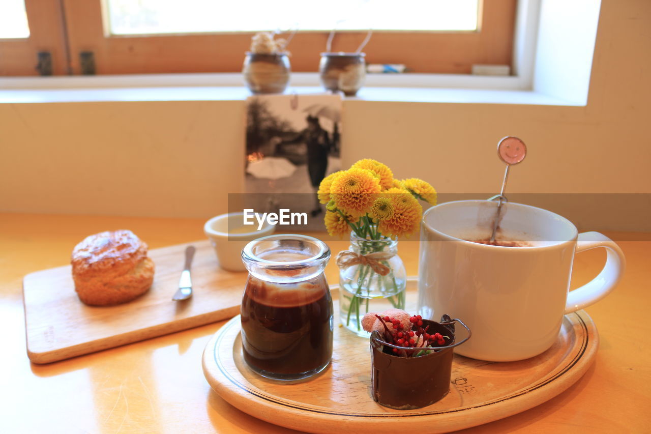 Flower vase on table