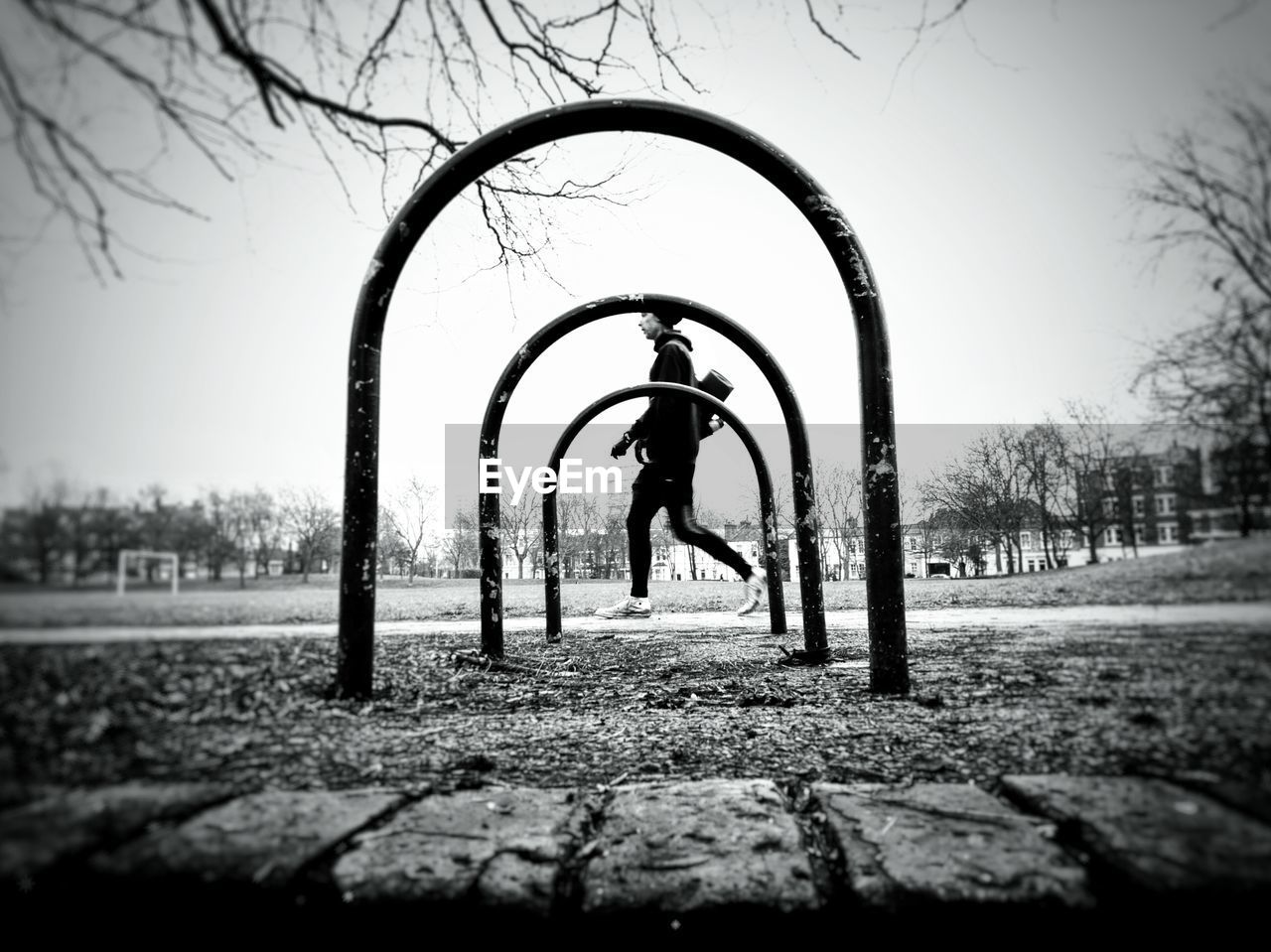 REFLECTION OF WOMAN ON TREE