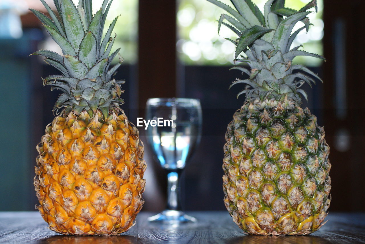 Close-up of fruits hanging on table