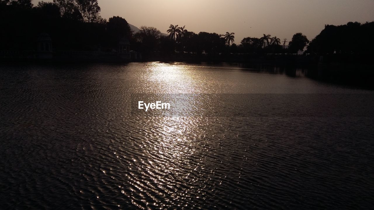 VIEW OF LAKE AT SUNSET