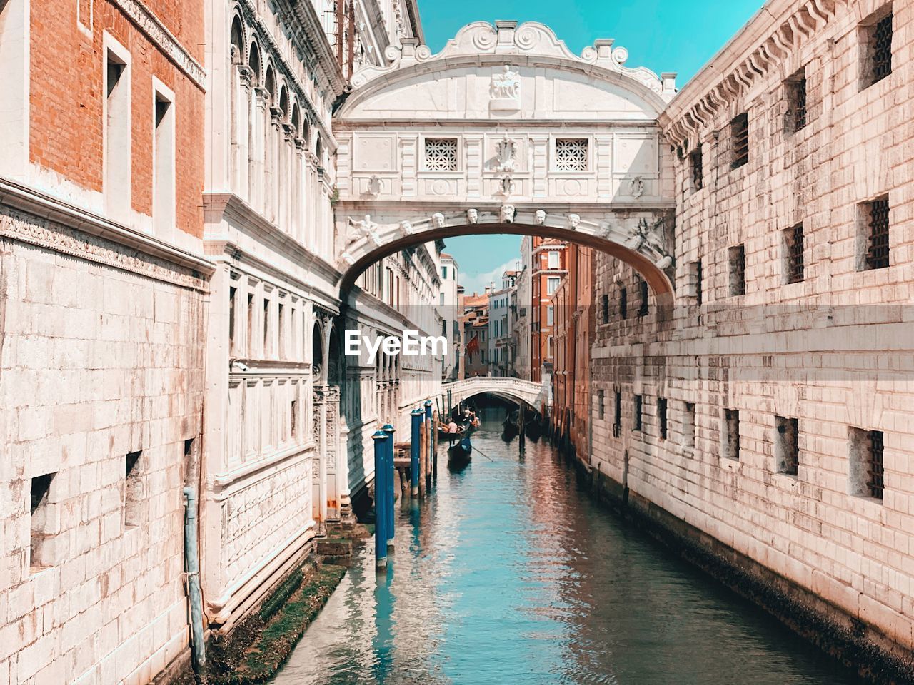 Canal passing through city buildings