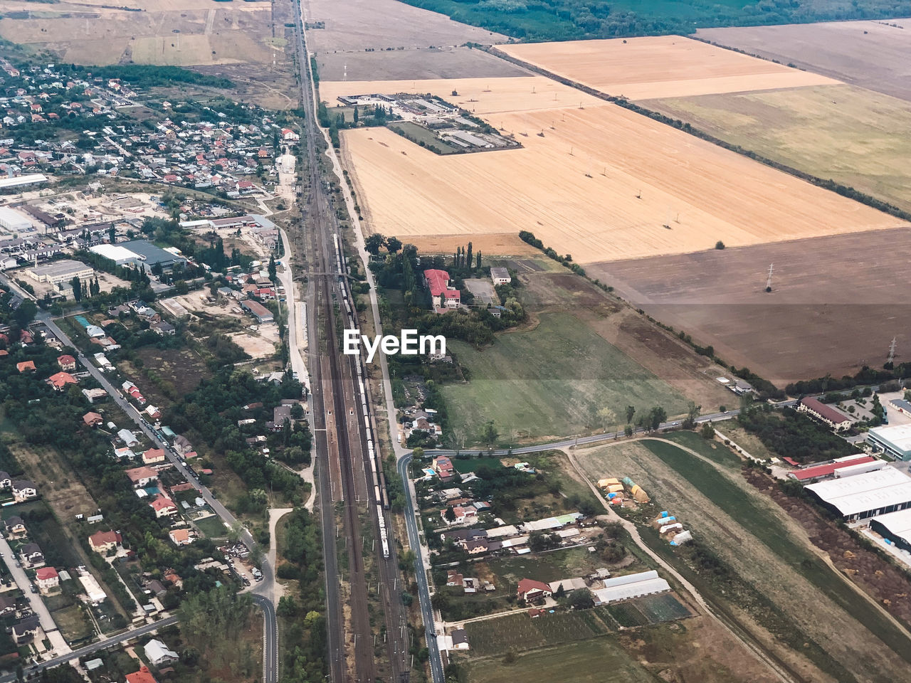 High angle view of road amidst buildings in city