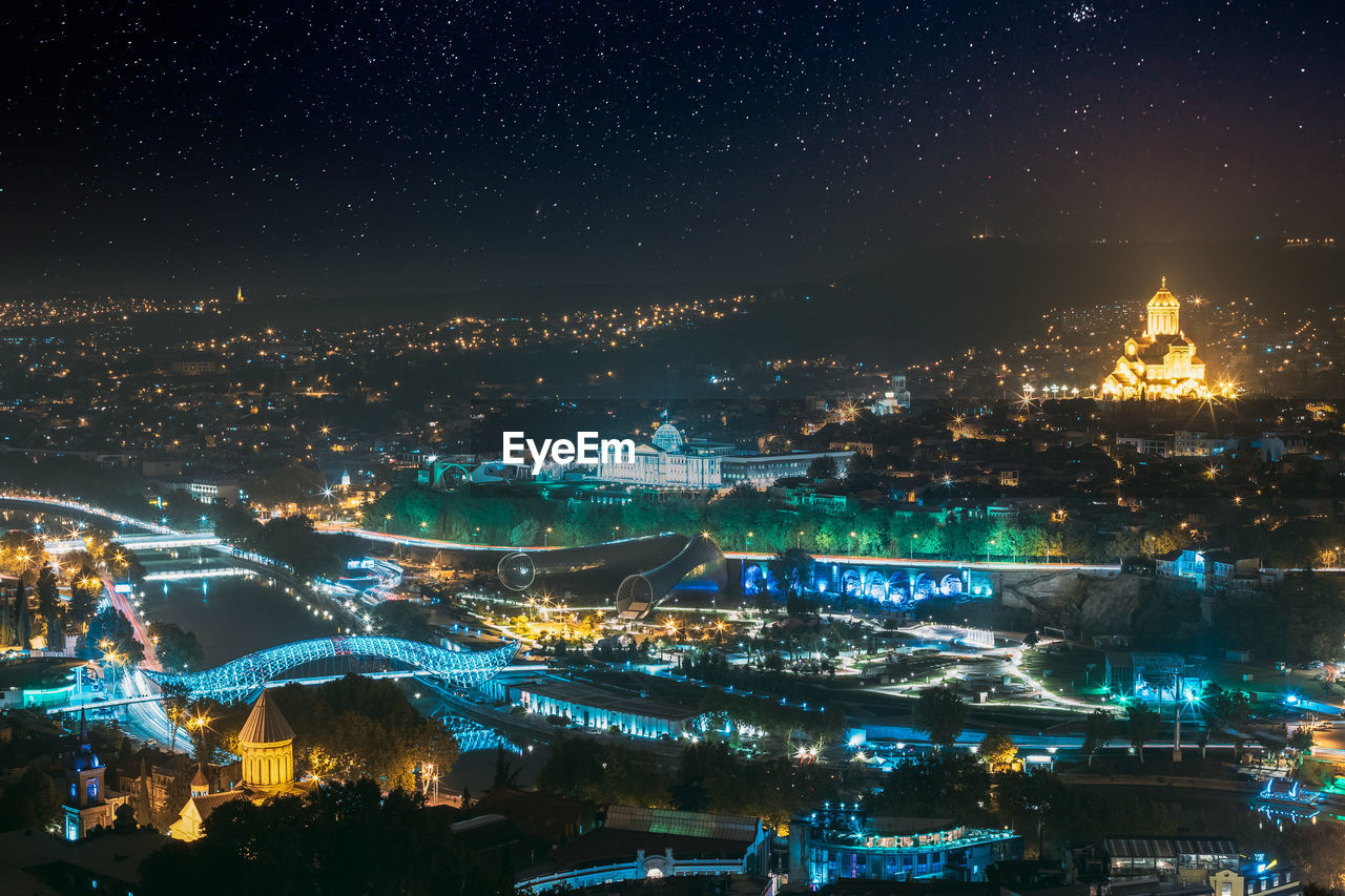 high angle view of illuminated city at night