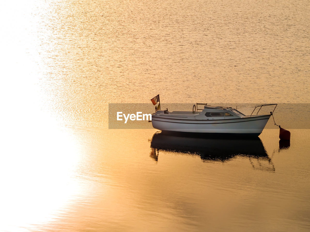 BOATS SAILING IN LAKE