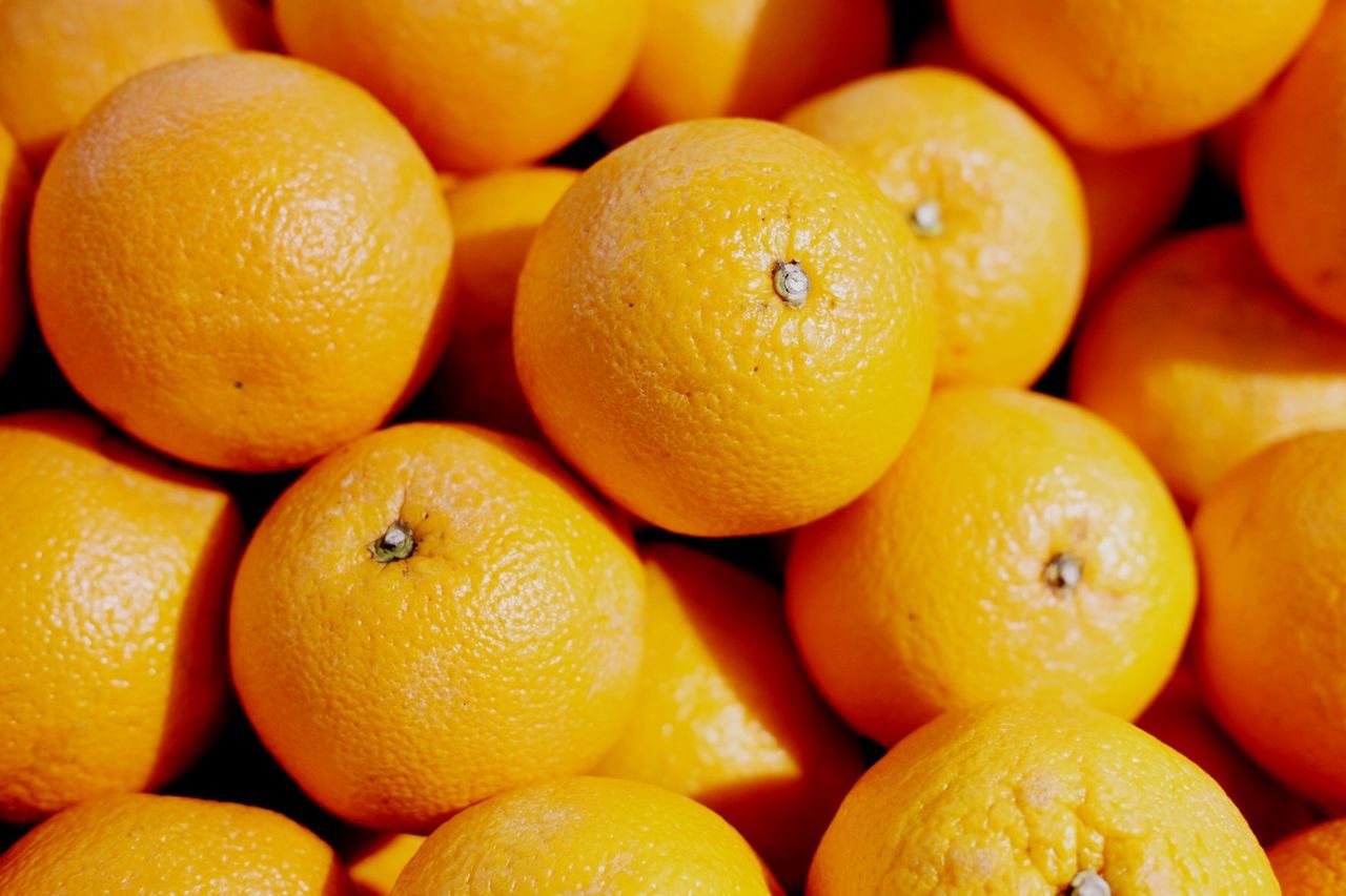 Full frame shot of oranges for sale at market