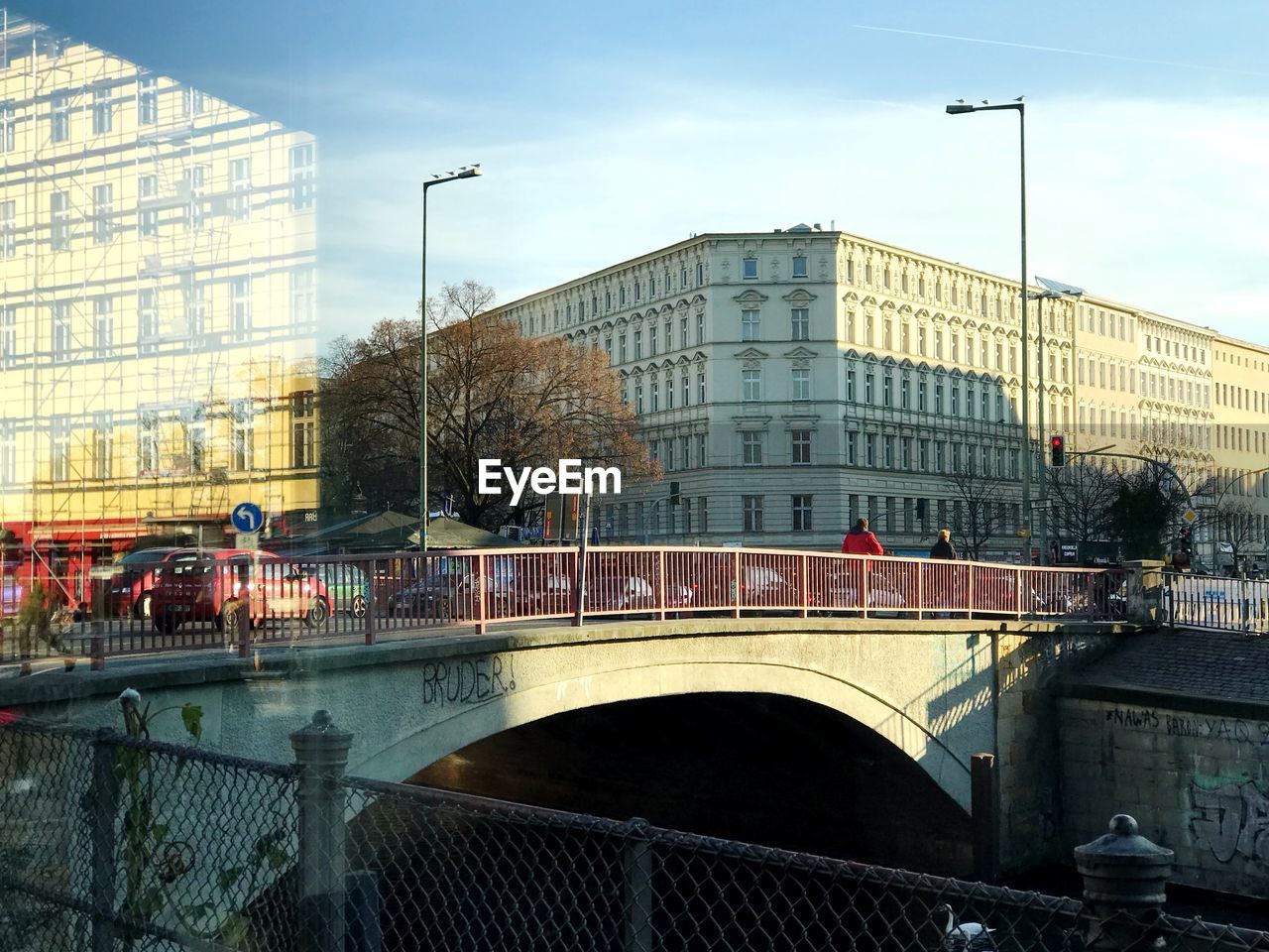 View of bridge in city against sky