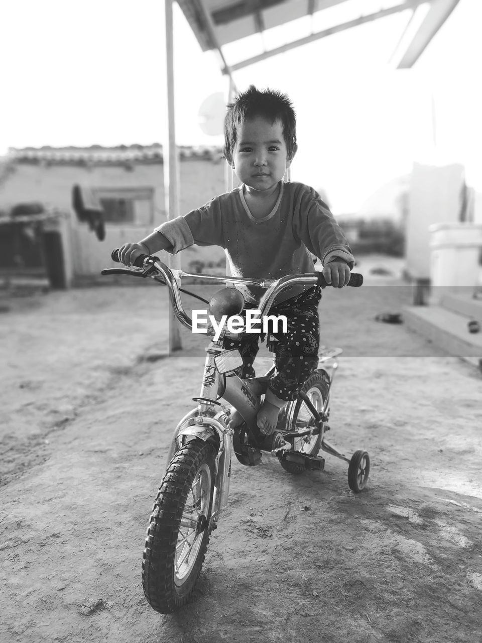 Portrait of boy riding motorcycle