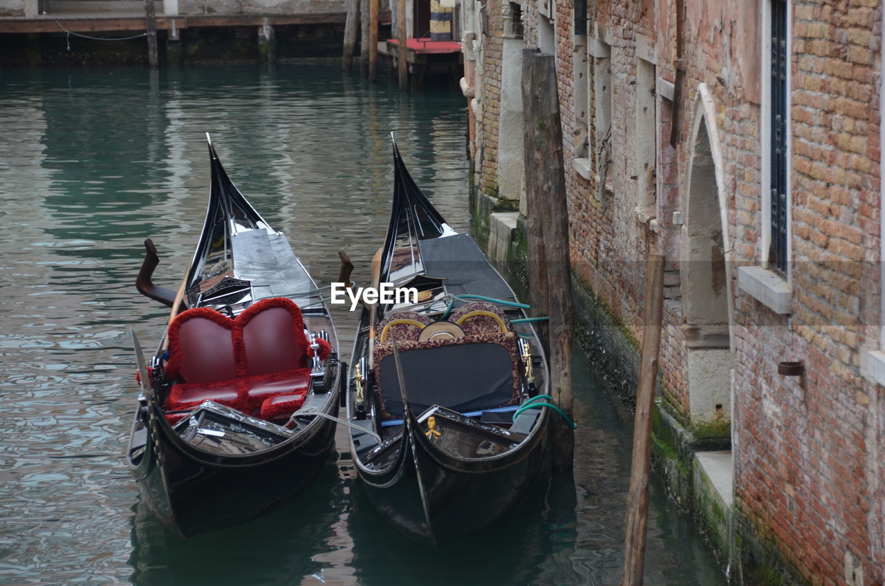 Boats moored in canal