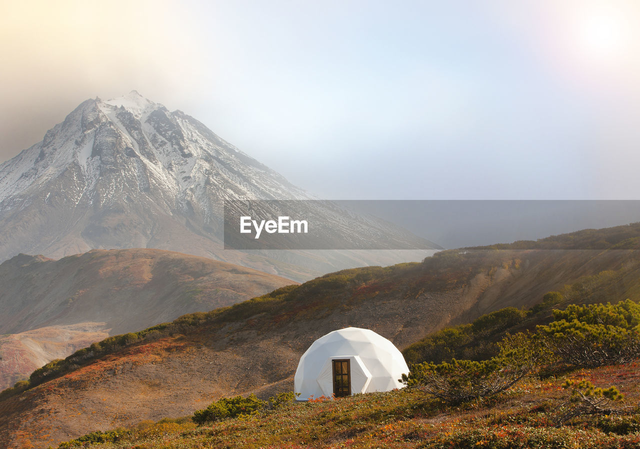 Glamping on volcano in kamchatka peninsula in sun light