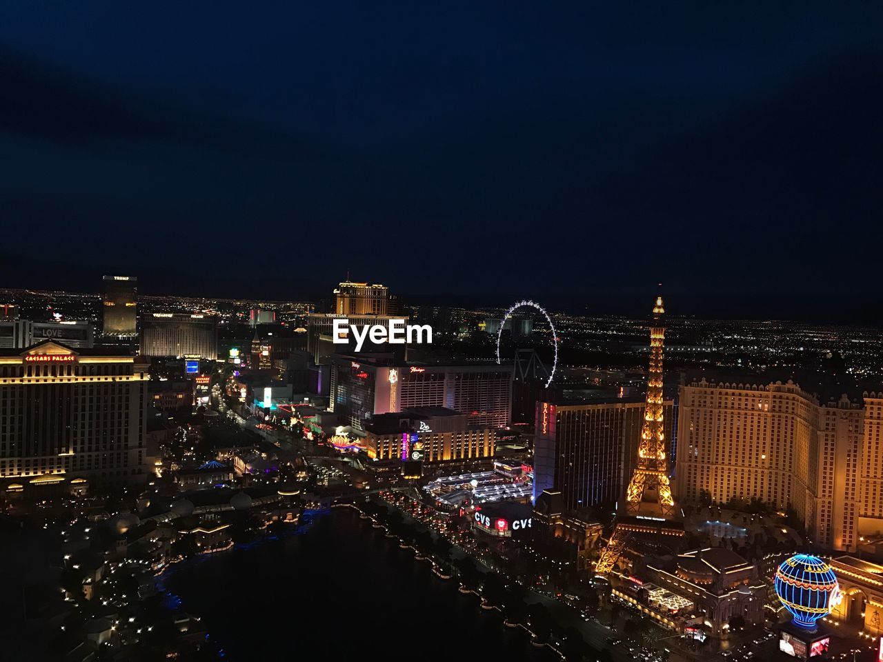 ILLUMINATED CITYSCAPE AT NIGHT