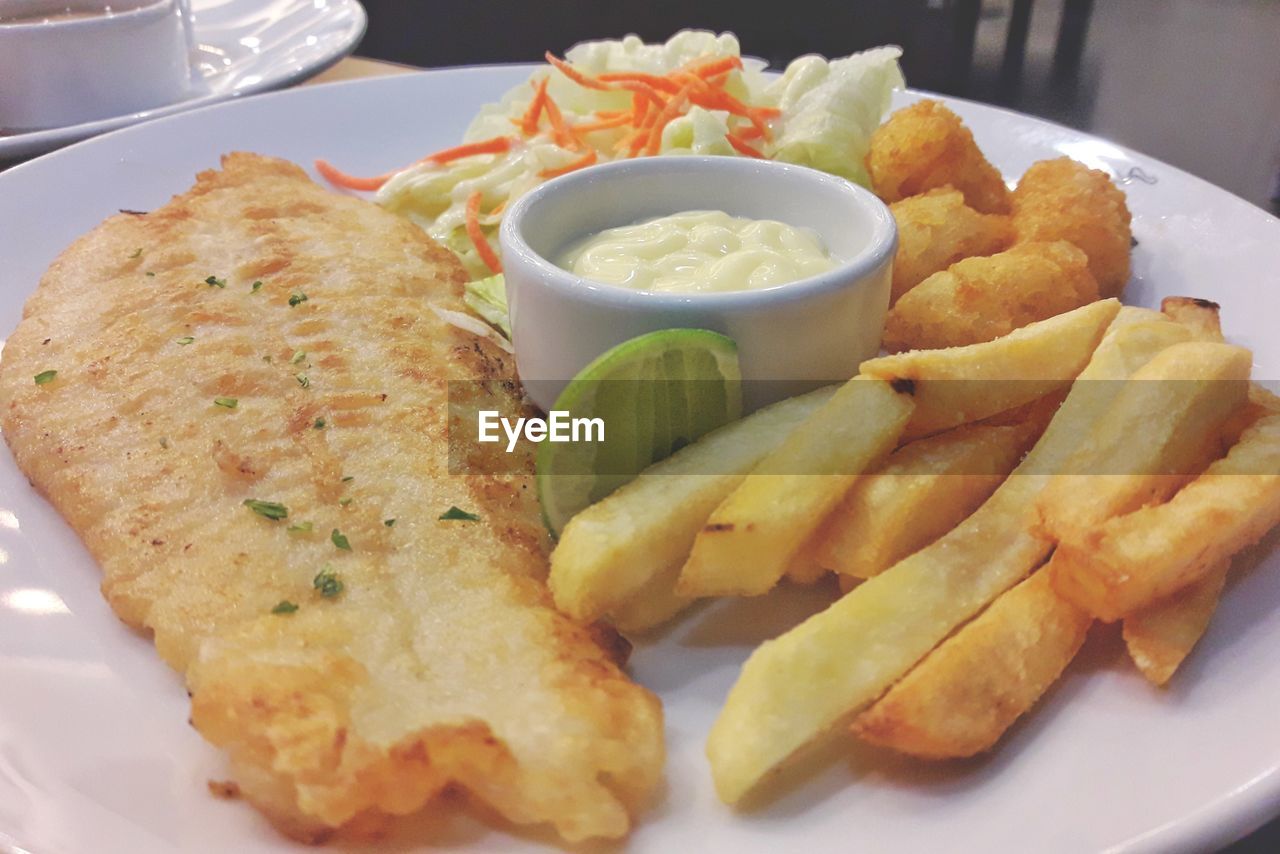 CLOSE-UP OF SERVED FOOD IN PLATE WITH SAUCE