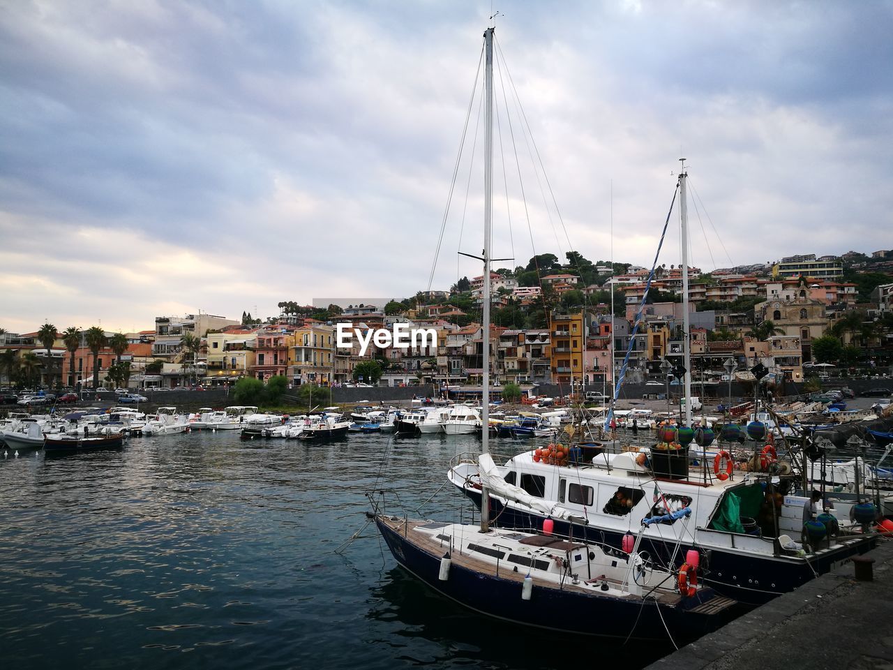 BOATS IN MARINA AT HARBOR