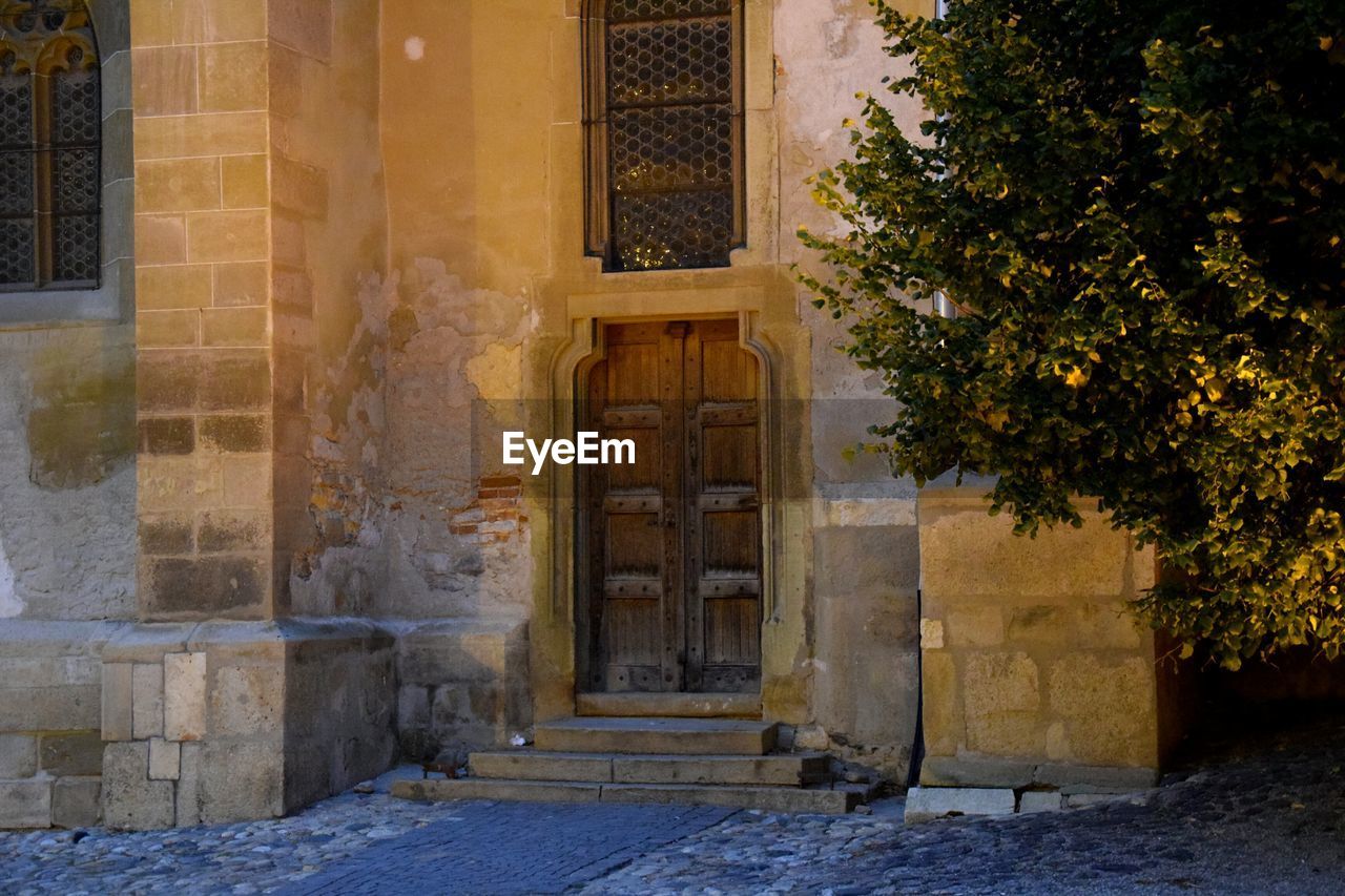 OPEN DOOR OF HISTORICAL BUILDING