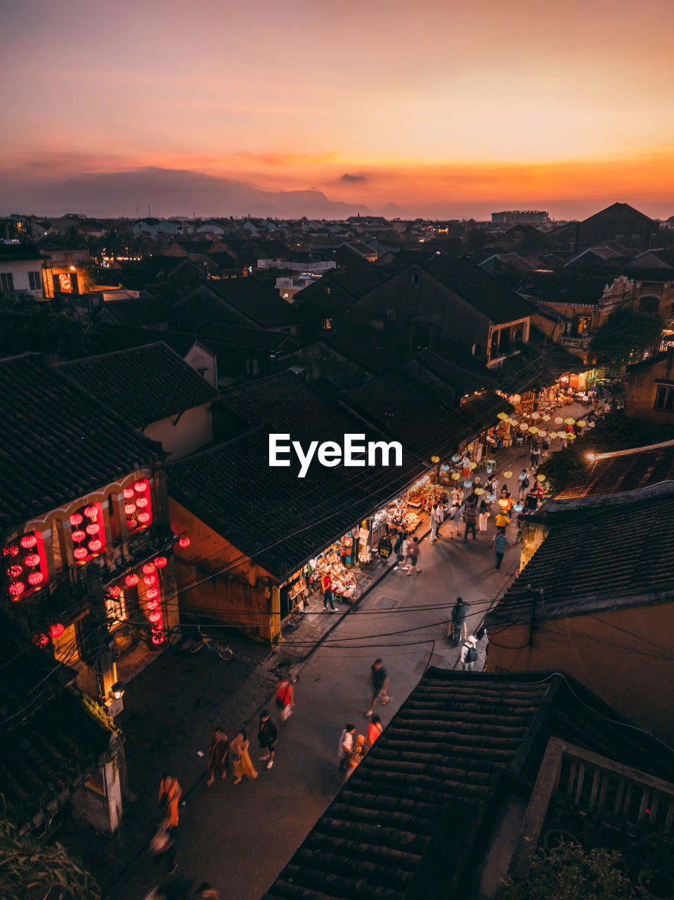 High angle view of cityscape against sky during sunset