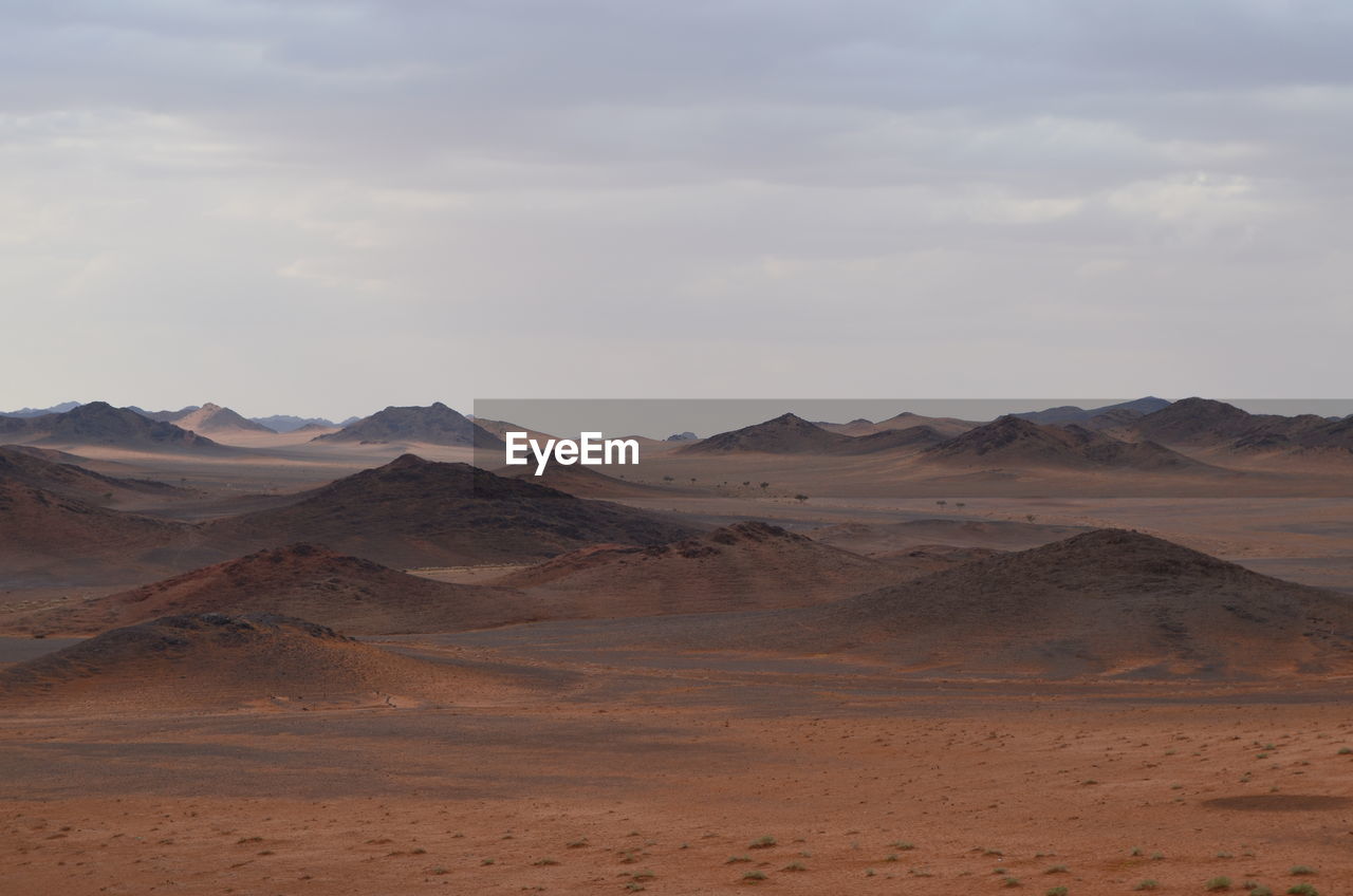 Scenic view of desert against sky