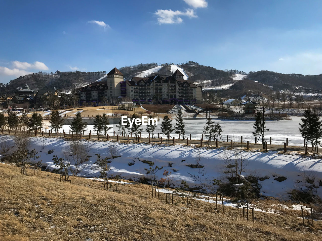 Scenic view of alpensia ski resort against blue sky, pyeongchang, south korea