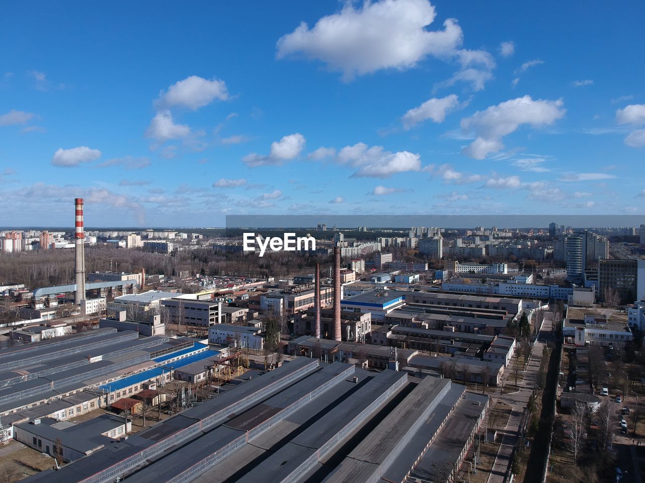 High angle view of railroad tracks amidst buildings in city