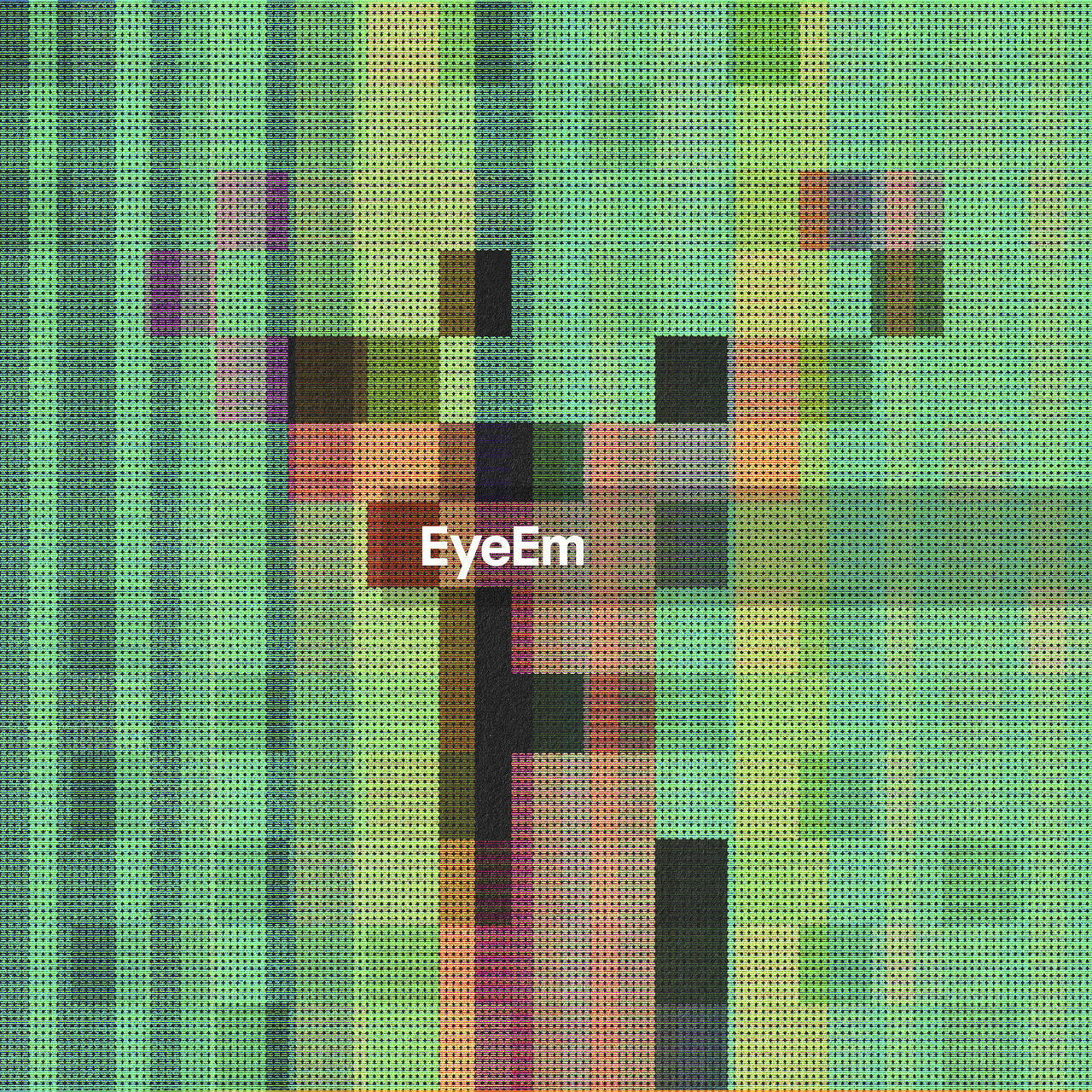 Full frame shot of pixelated deer on green background