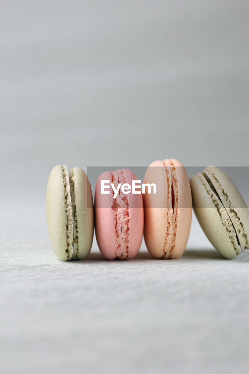 Pastel macarons in bright photo on selective focus
