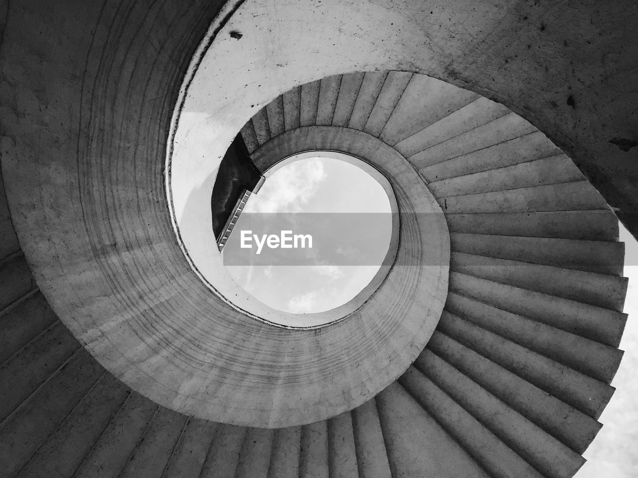Digital composite image of spiral staircase