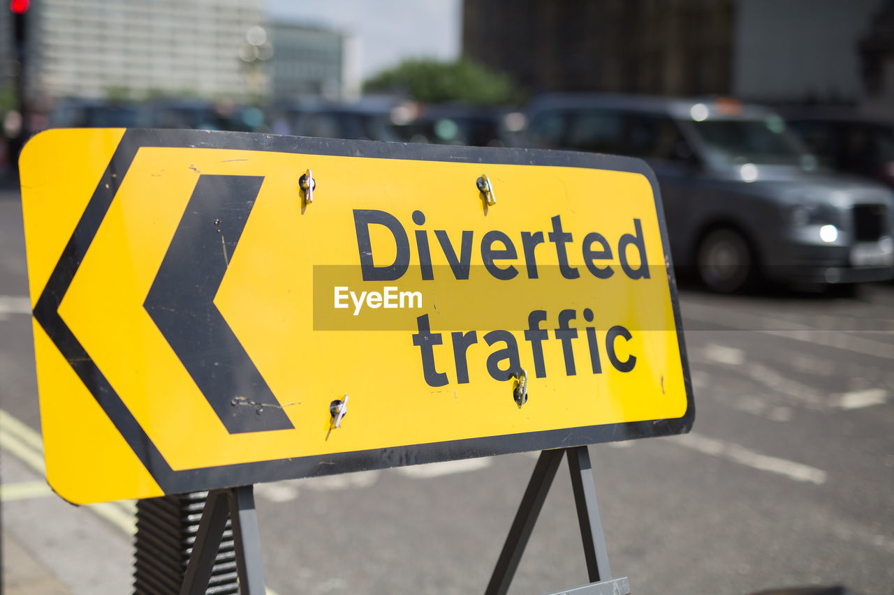 Information sign on road in city