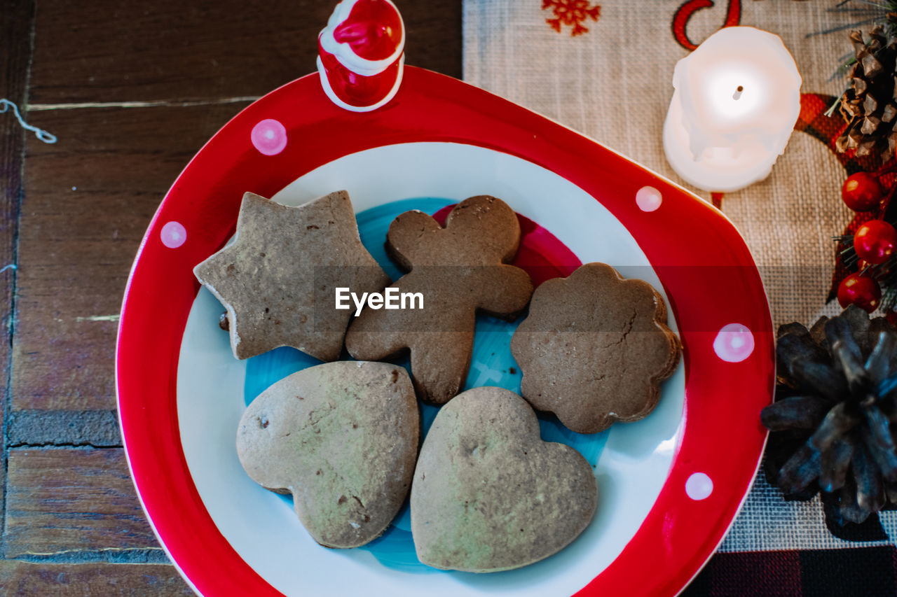 High angle view of cookies in plate on table