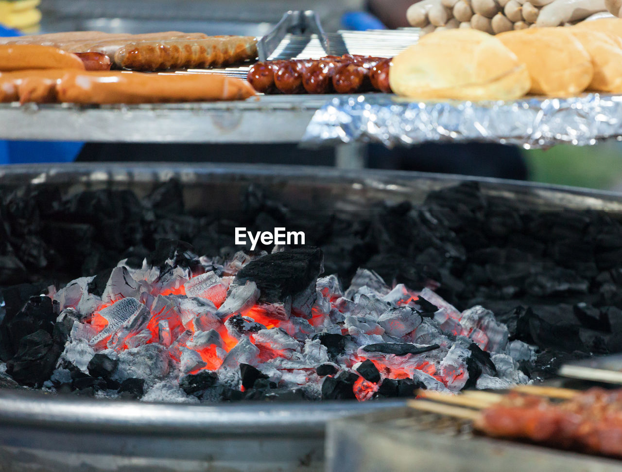 Grilled meat on a hot grill. specialty meat sold as street food.