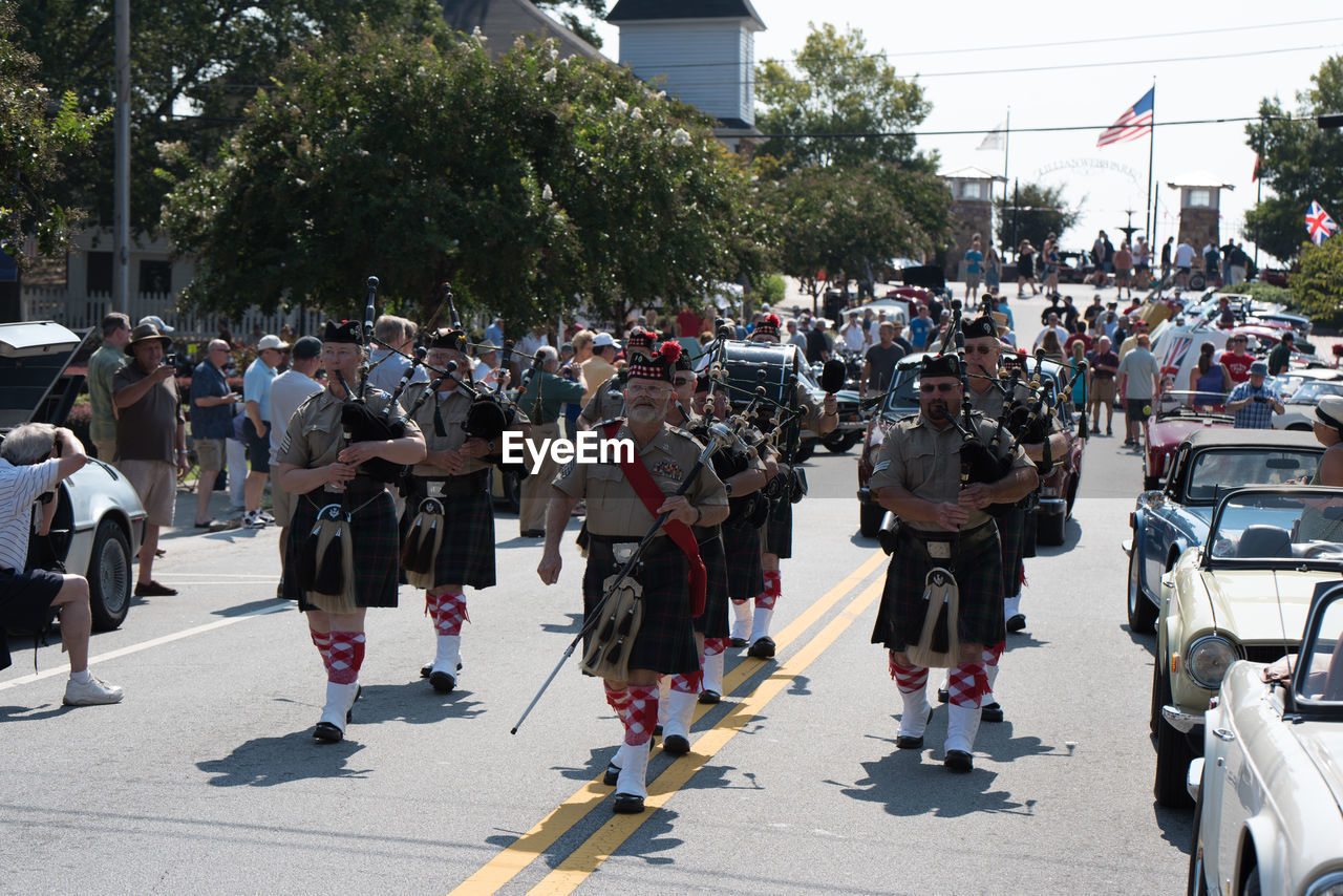 PANORAMIC VIEW OF PEOPLE IN TRADITIONAL CLOTHING