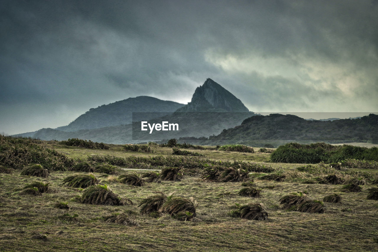 Scenic view of land against sky