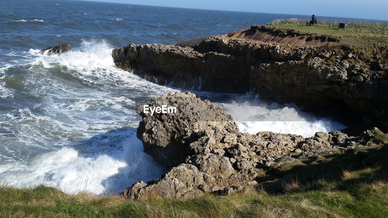 SCENIC VIEW OF ROCKS ON SHORE