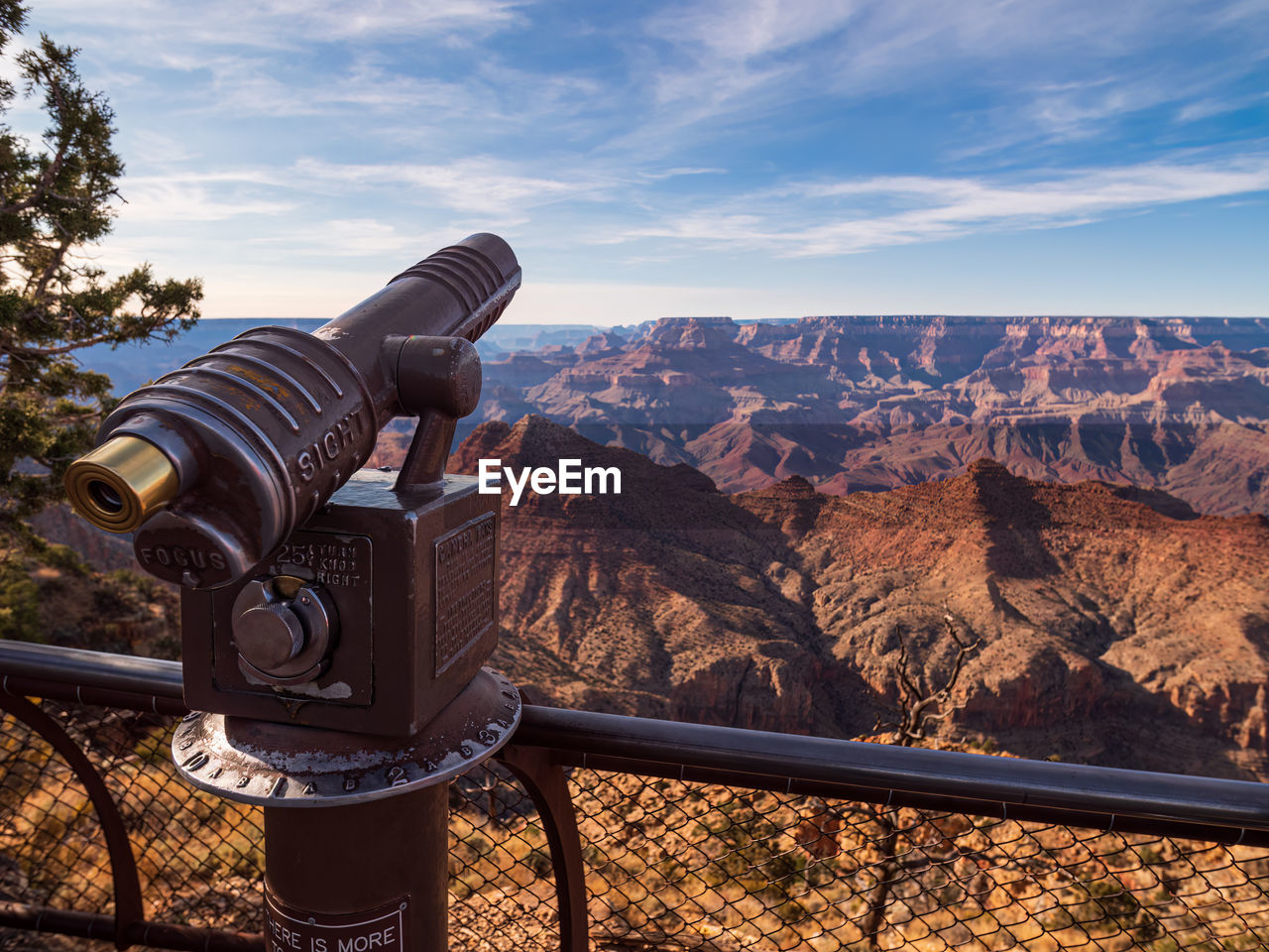 scenics - nature, sky, landscape, nature, travel destinations, binoculars, beauty in nature, environment, coin operated, observation point, tourism, travel, astronomy, optical instrument, mountain, coin-operated binoculars, telescope, non-urban scene, cloud, no people, technology, outdoors, tranquil scene, architecture, day, tranquility, land, discovery, hand-held telescope, railing, mountain range, exploration, surveillance