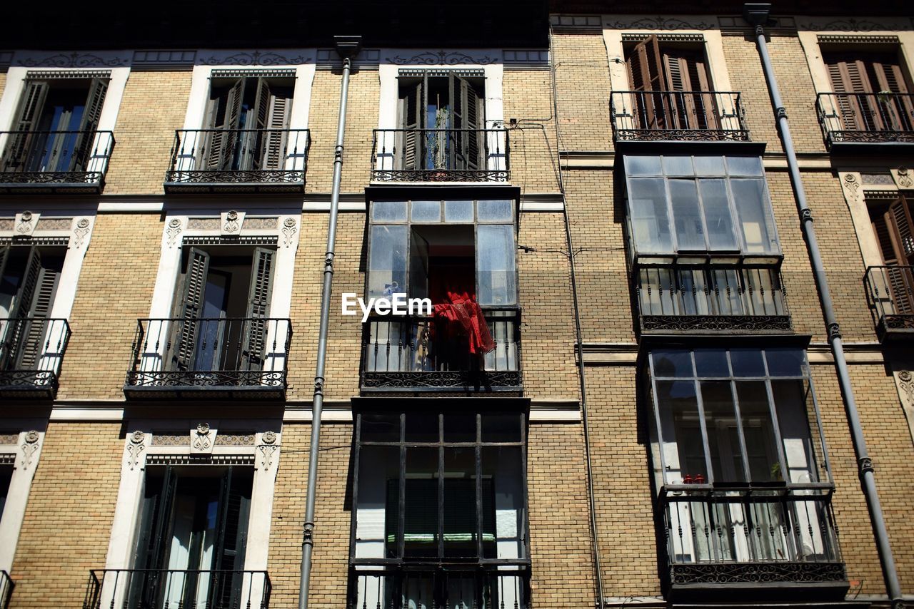 LOW ANGLE VIEW OF RESIDENTIAL BUILDING