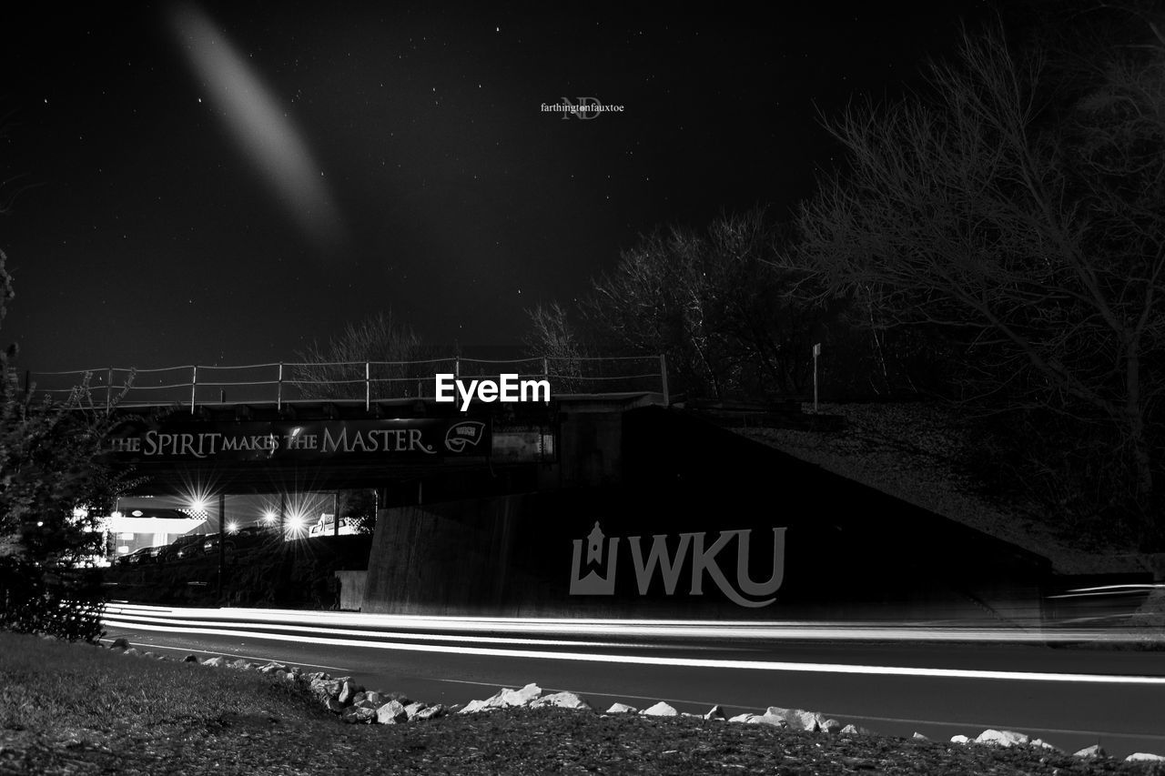 VIEW OF RAILROAD TRACKS AGAINST SKY