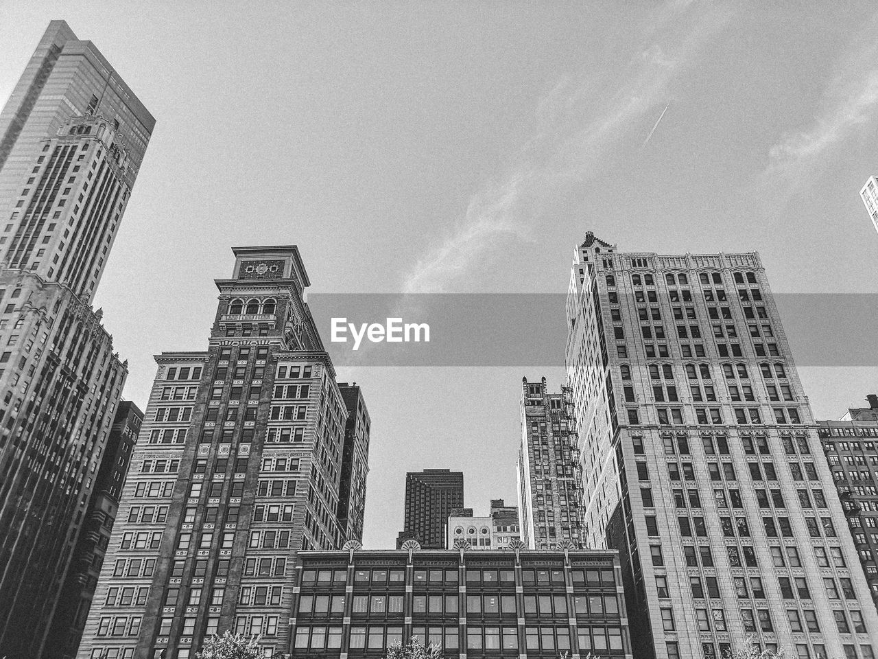 Low angle view of buildings against sky in city