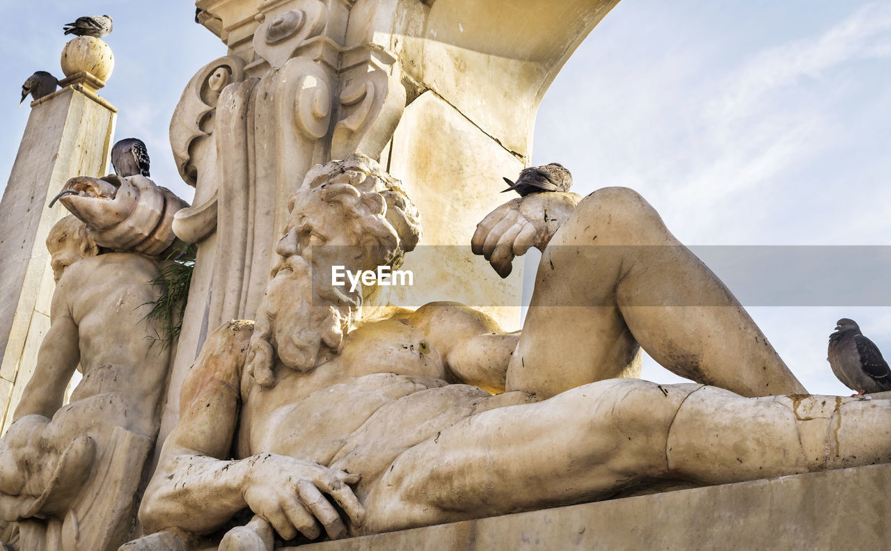 Low angle view of fontana del sebeto