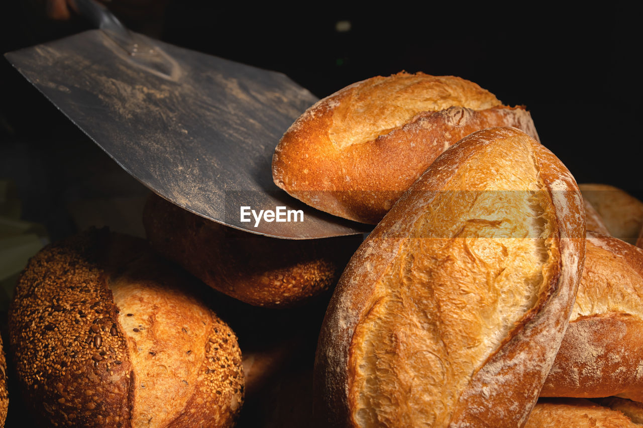 Fresh artisan bread only from the oven on a baking shovel. appetizing fresh and healthy bread