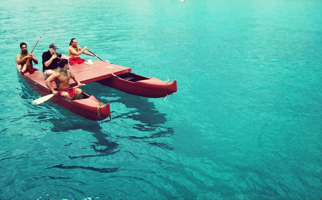 PEOPLE ON BOAT IN WATER