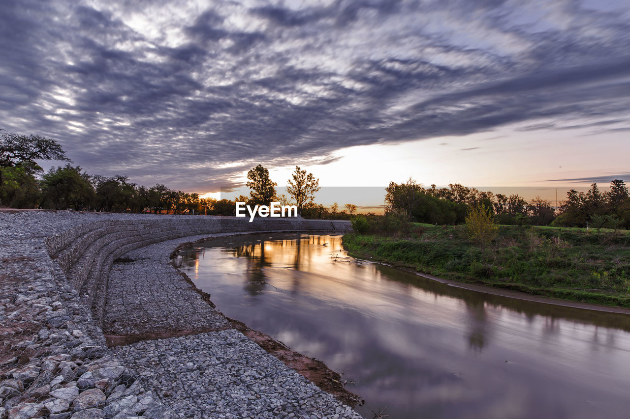 ARCH BRIDGE OVER RIVER AGAINST SKY